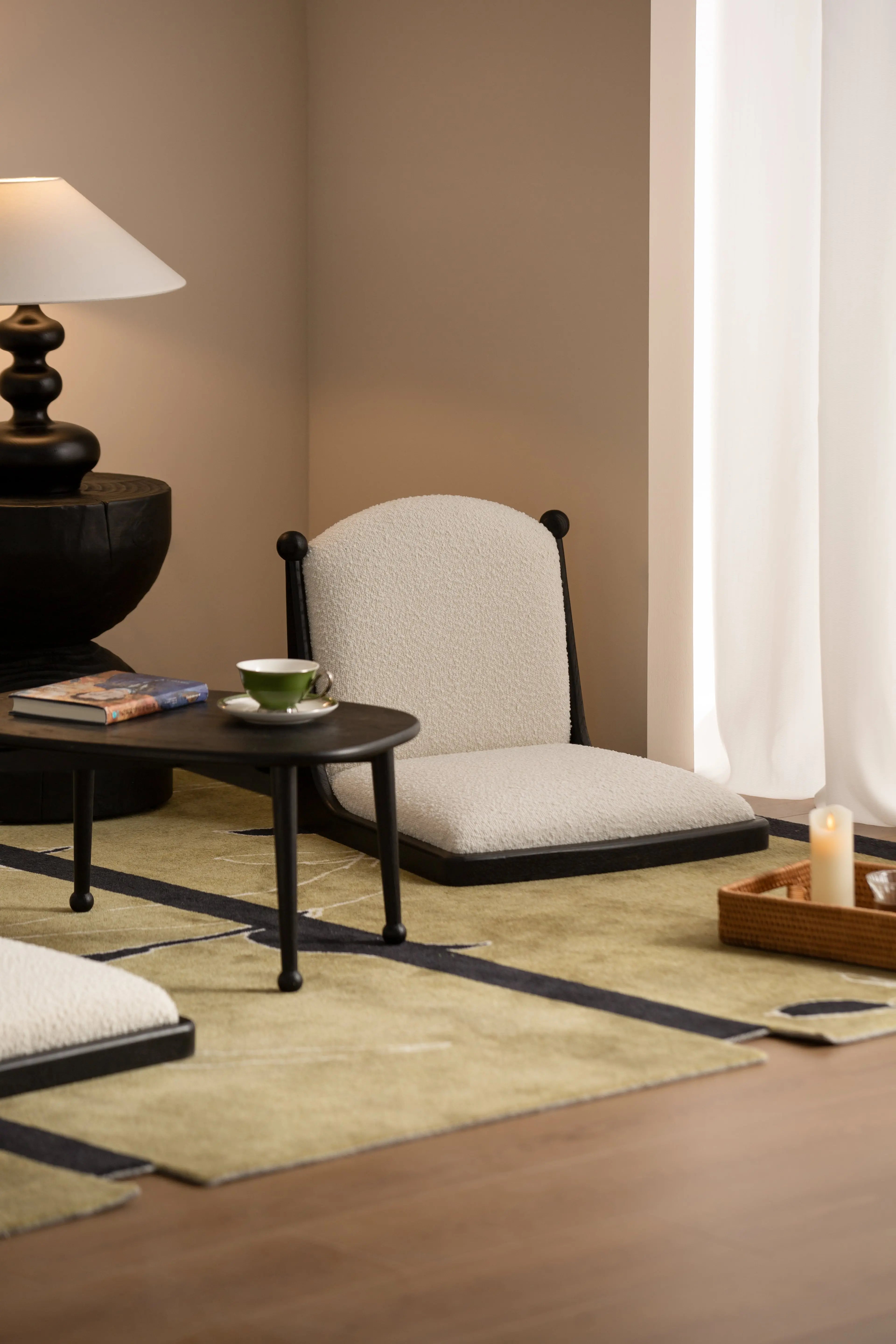 Cozy Bay Window Nook Set with Cushioned Floor Chair and Wooden Tea Table