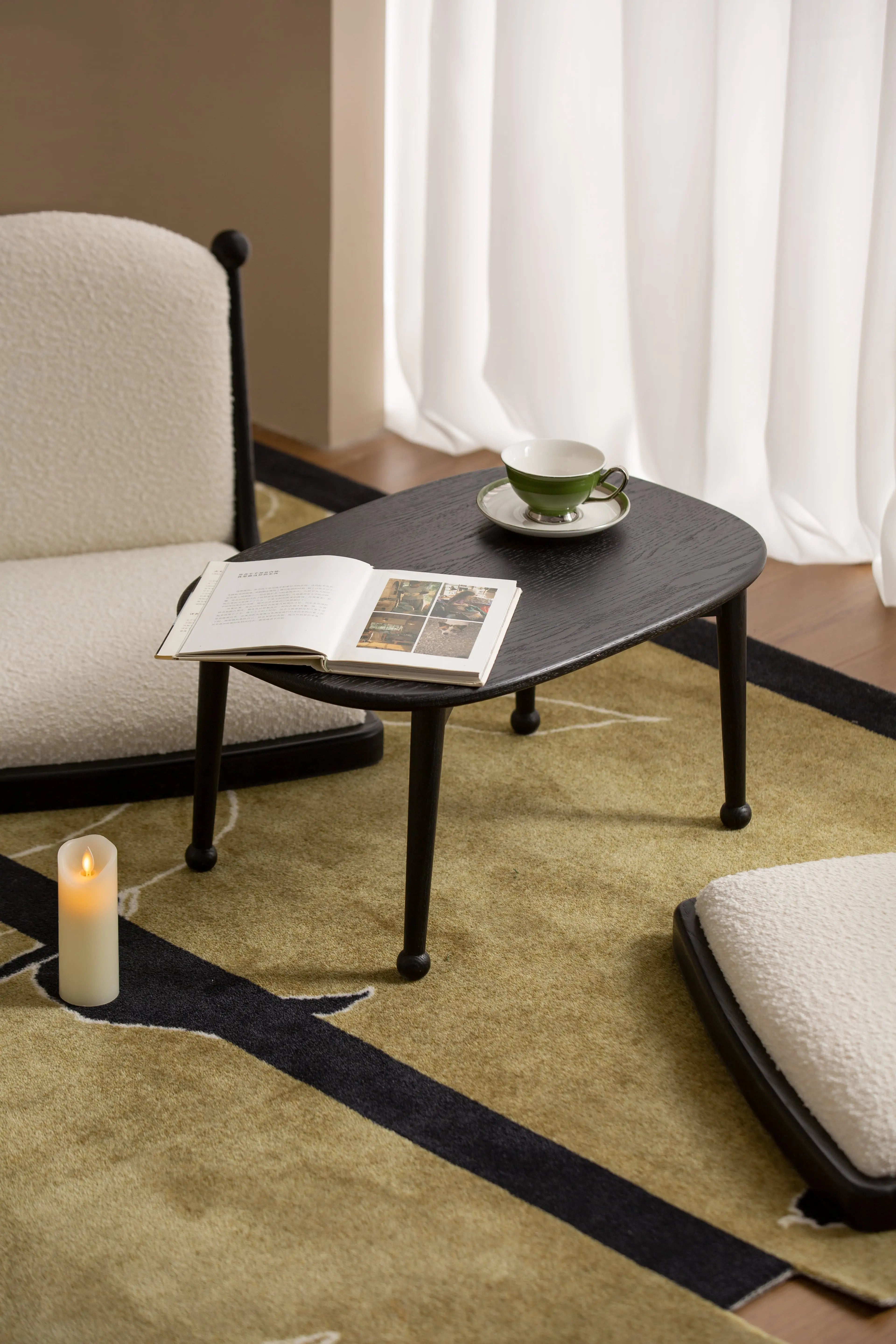 Cozy Bay Window Nook Set with Cushioned Floor Chair and Wooden Tea Table